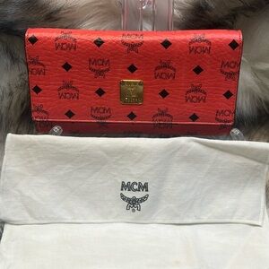 MCM wallet with pink interior, NWOT